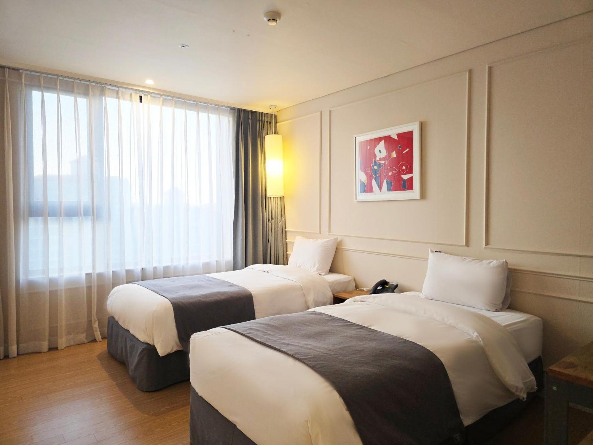 โรงแรมเจเค บลอสซัม โรงแรม 4*